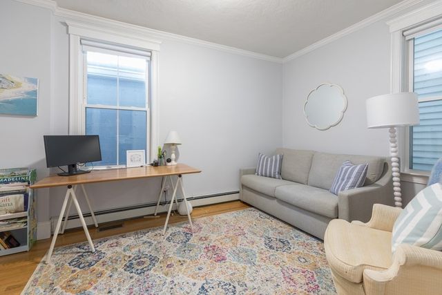 a living room with furniture and a couch
