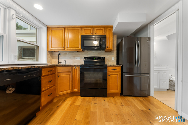 62 Chatham Road Berlin, CT 06037 - Photo 28 of 38 a kitchen with a refrigerator stove and sink