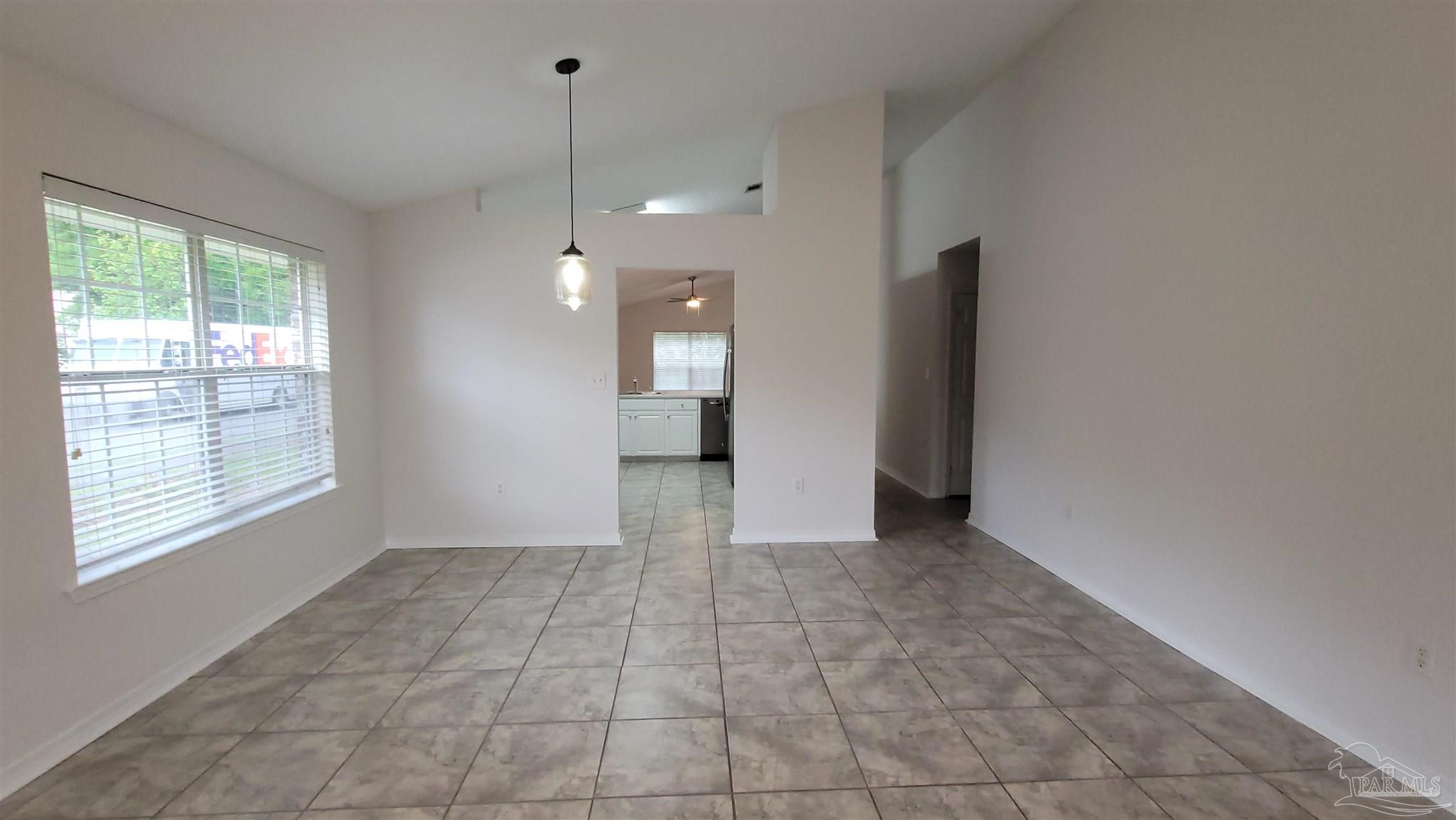 3741 Monopoly Court Gulf Breeze, FL 32563 - Photo 17 of 17 a view of a kitchen with a sink and a window