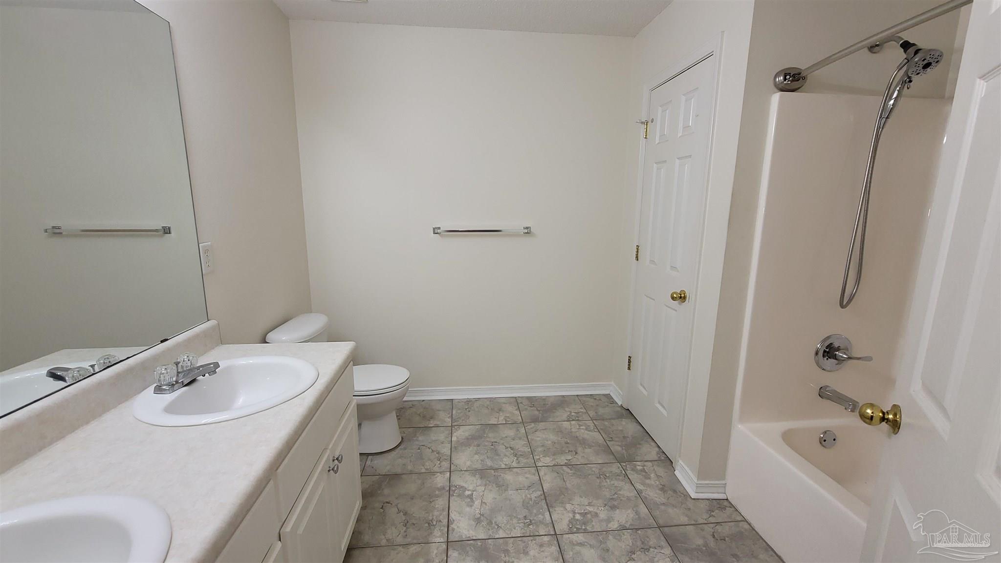 3741 Monopoly Court Gulf Breeze, FL 32563 - Photo 4 of 17 a bathroom with a sink toilet and shower