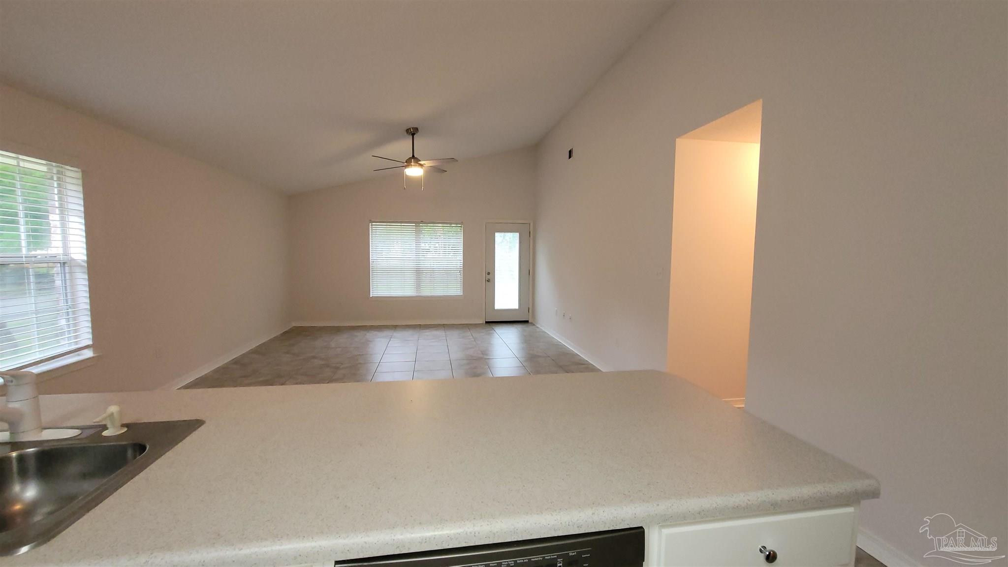 3741 Monopoly Court Gulf Breeze, FL 32563 - Photo 5 of 17 a view of an empty room with a window