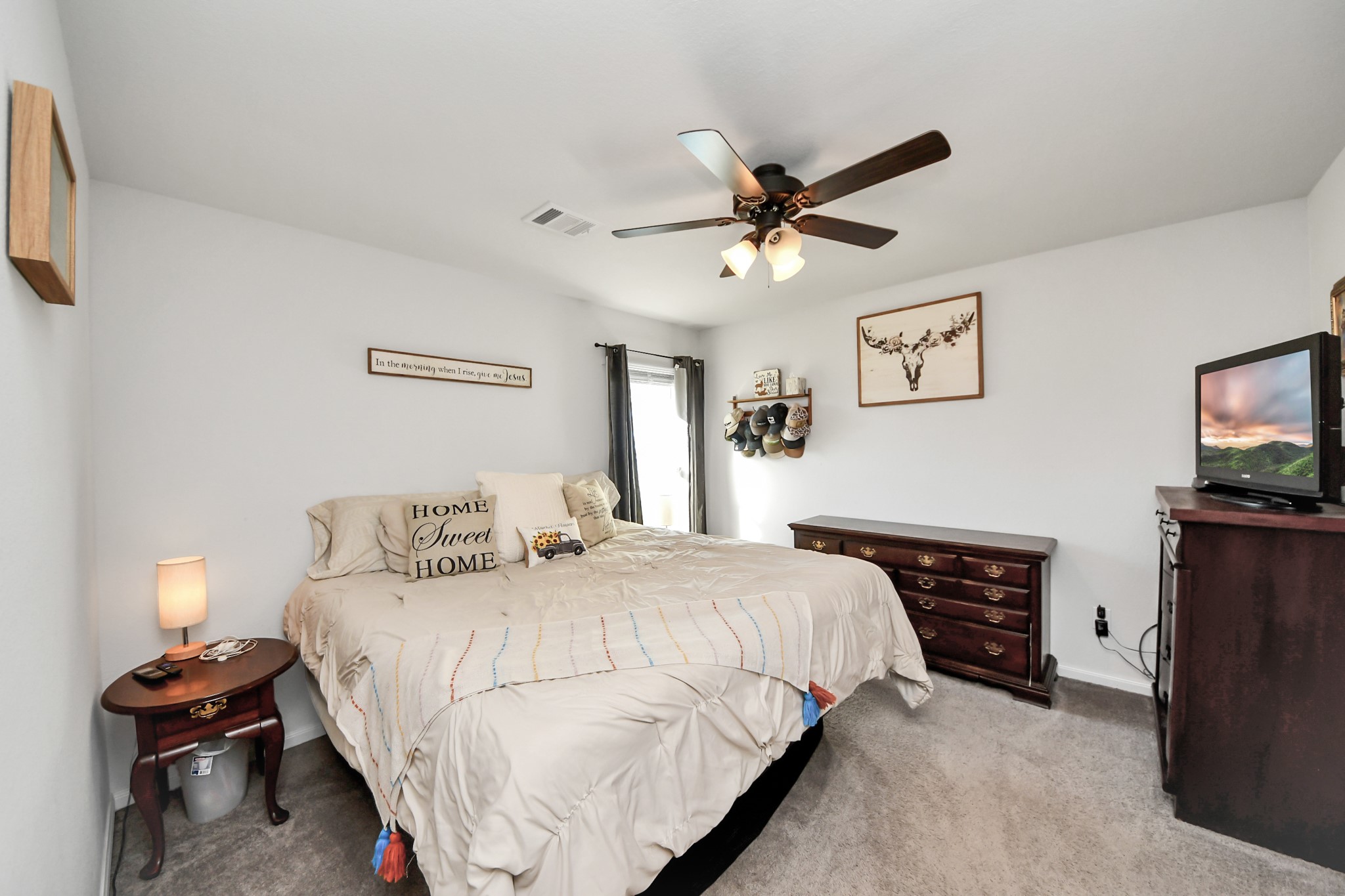15291 Arrowhead Loop West Willis, TX 77378 - Photo 15 of 28 Primary bedroom view coming in.