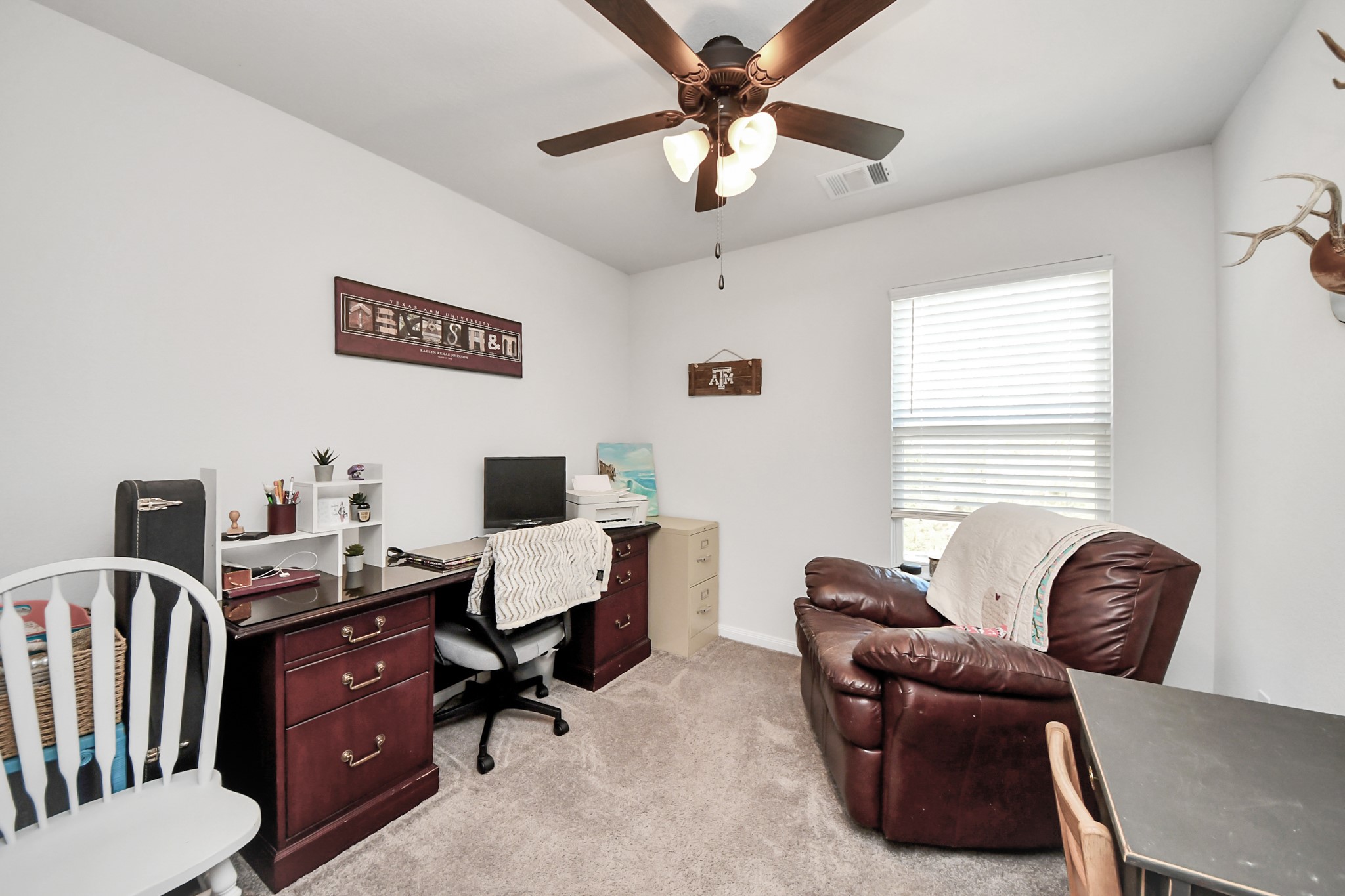 15291 Arrowhead Loop West Willis, TX 77378 - Photo 17 of 28 Third bedroom upstair, facing the front of the house.