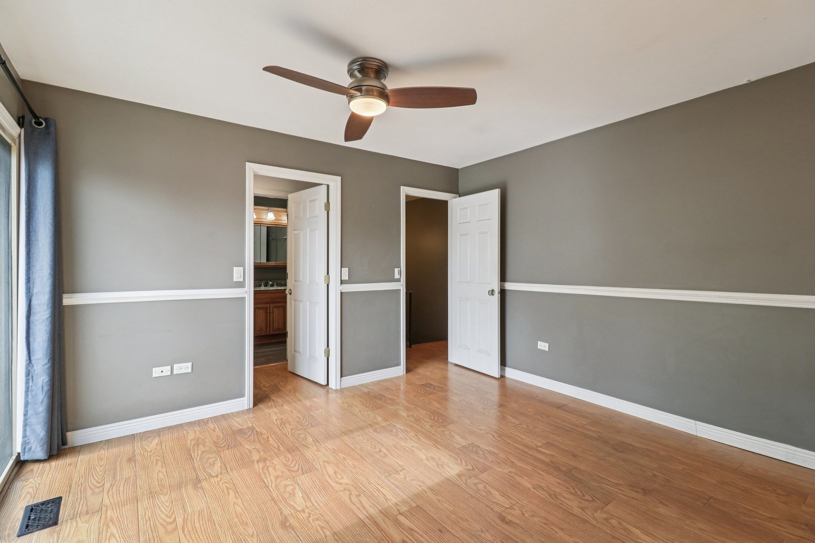 75 Mineola Road, Unit 75 Fox Lake, IL 60020 - Photo 16 of 33 an empty room with closet and windows