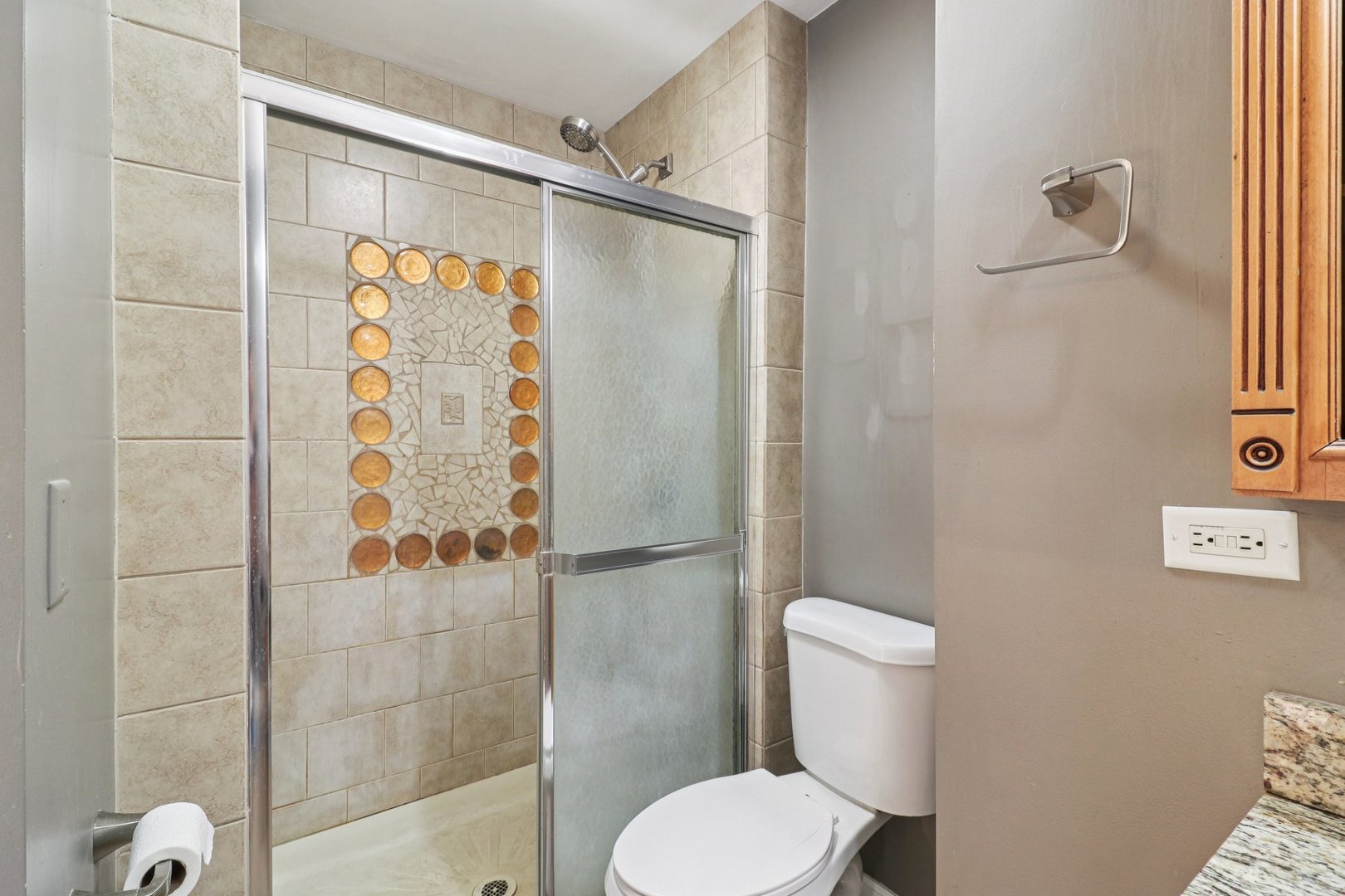 75 Mineola Road, Unit 75 Fox Lake, IL 60020 - Photo 20 of 33 a white toilet sitting next to a bathroom sink