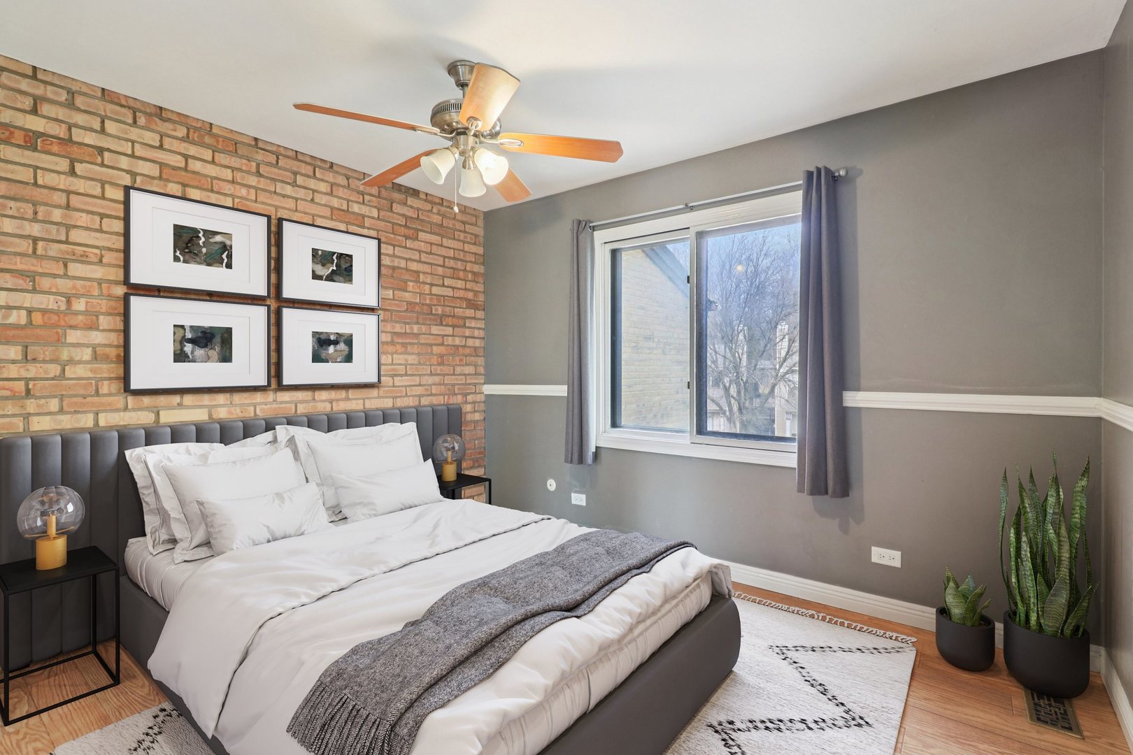 75 Mineola Road, Unit 75 Fox Lake, IL 60020 - Photo 21 of 33 a bedroom with a large bed and a window