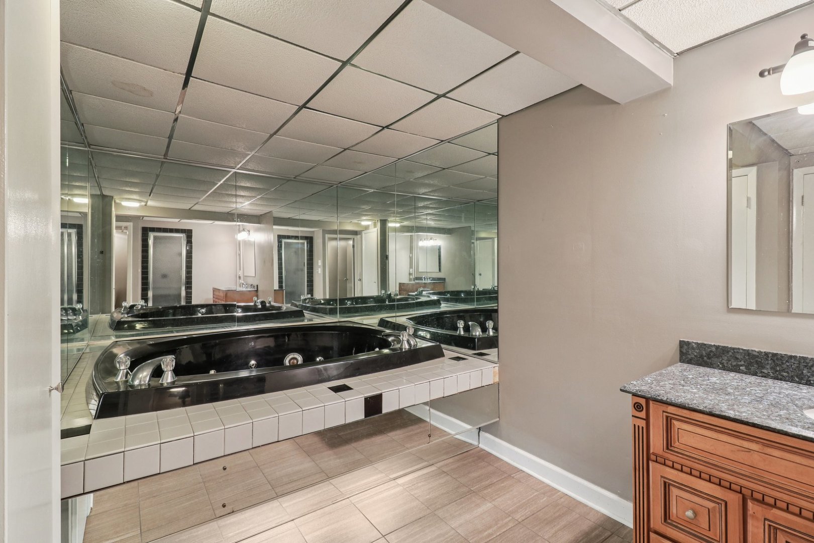 75 Mineola Road, Unit 75 Fox Lake, IL 60020 - Photo 27 of 33 a large white kitchen with a stove and a refrigerator