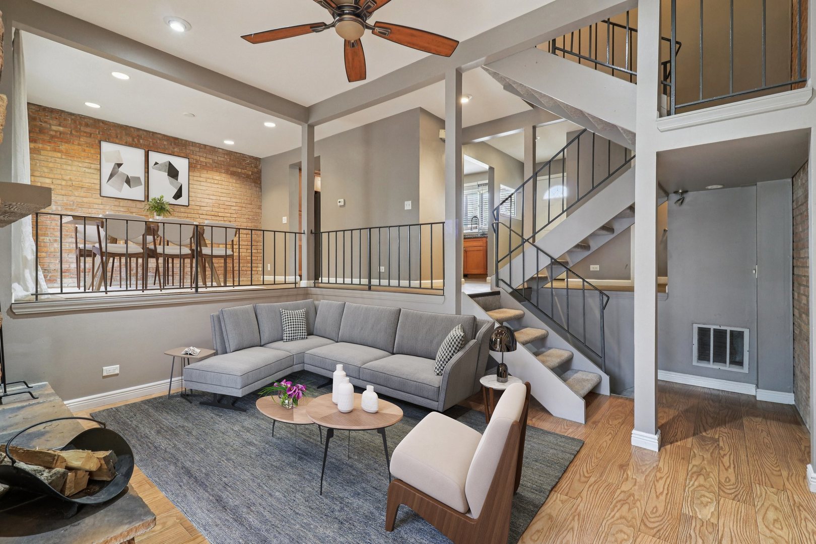 75 Mineola Road, Unit 75 Fox Lake, IL 60020 - Photo 4 of 33 a living room with furniture and a wooden floor