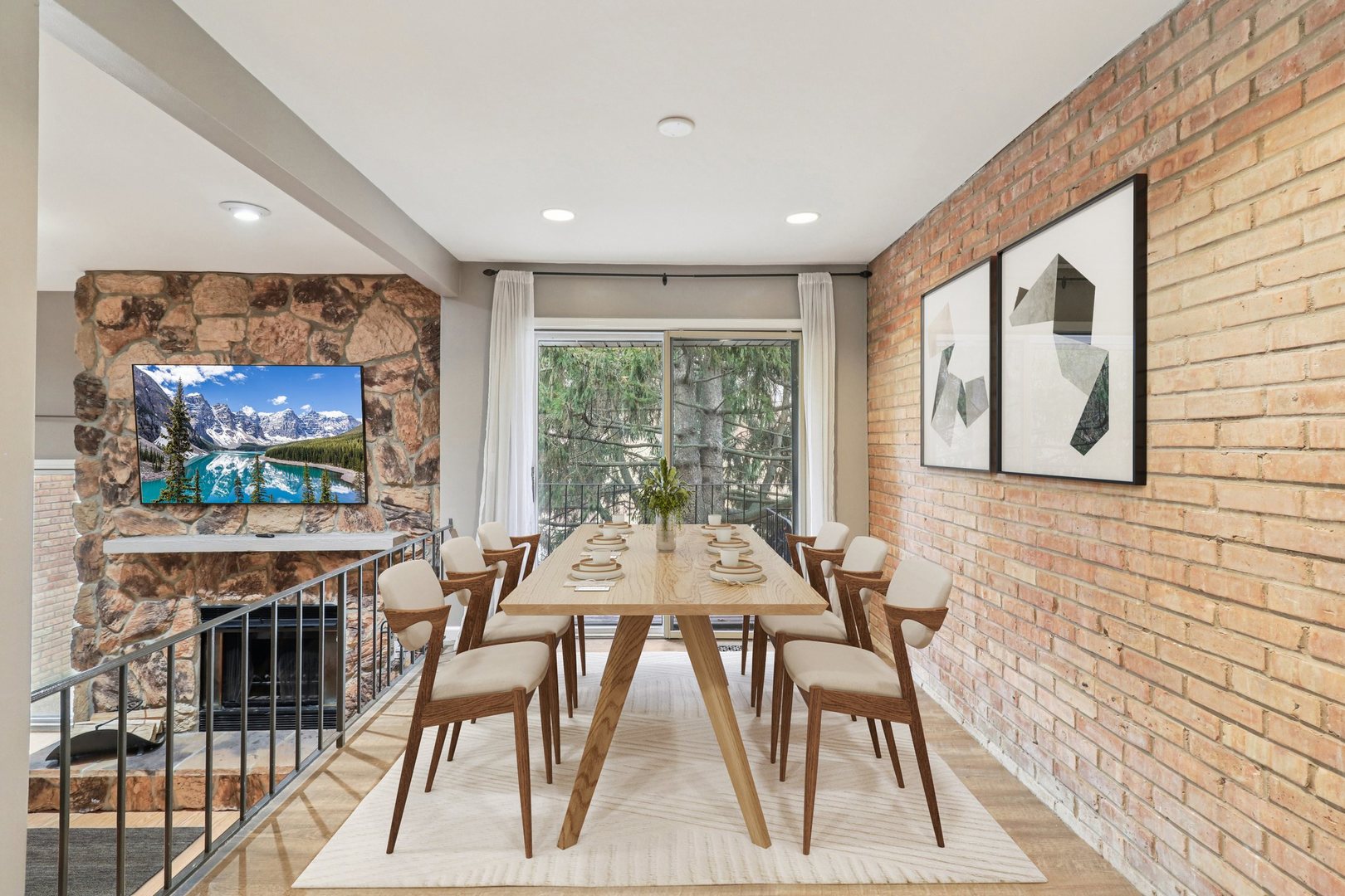 75 Mineola Road, Unit 75 Fox Lake, IL 60020 - Photo 7 of 33 a view of a dining room with furniture a rug and wooden floor