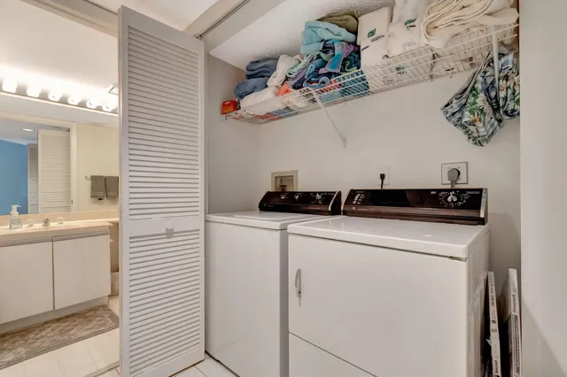 a utility room with dryer and washer