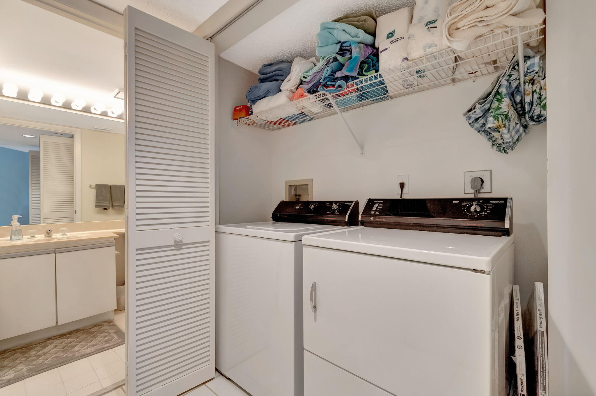 280 Northwest 67th Street, Unit B 207 Boca Raton, FL 33487 - Photo 10 of 13 a utility room with dryer and washer