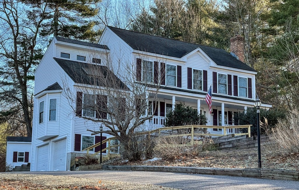 14 Mt Henry Road Shirley, MA 01464 - Photo 1 of 29 a front view of a house with a yard