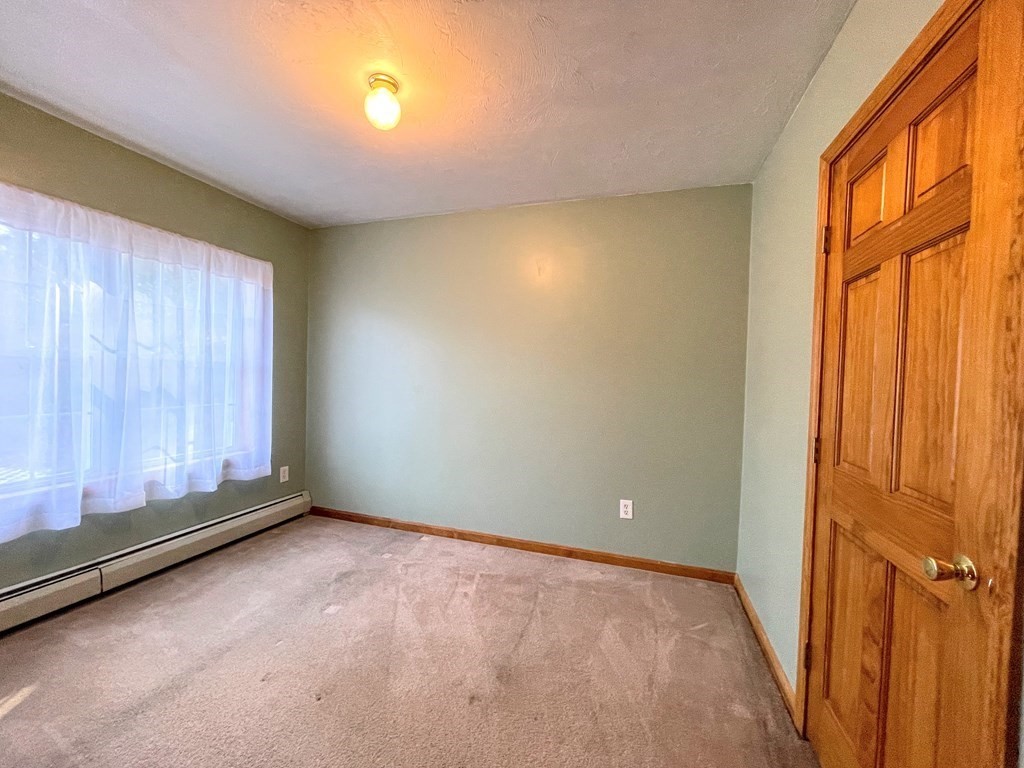 14 Mt Henry Road Shirley, MA 01464 - Photo 16 of 29 a view of an empty room with a window