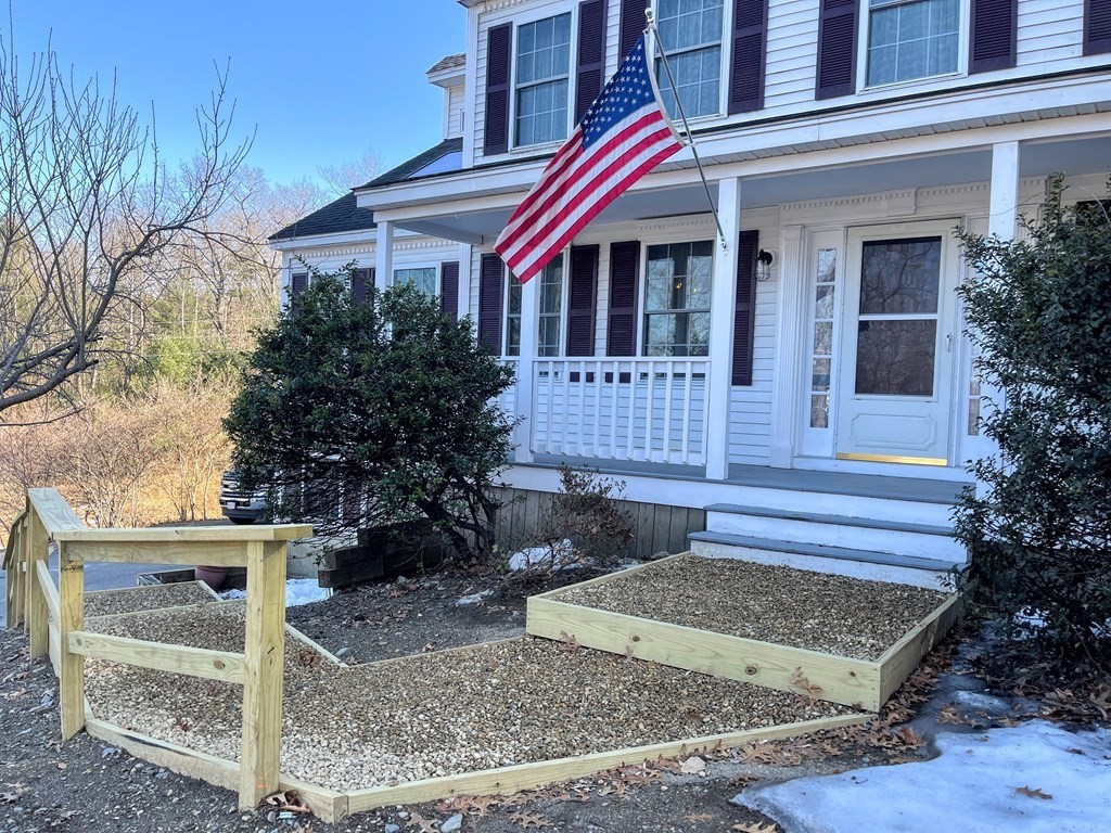 14 Mt Henry Road Shirley, MA 01464 - Photo 2 of 29 a front view of a house with garden