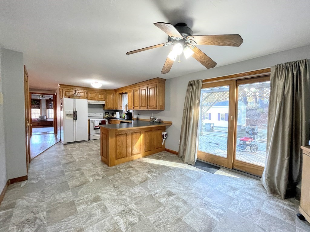 14 Mt Henry Road Shirley, MA 01464 - Photo 4 of 29 a view of a kitchen with a sink and a window