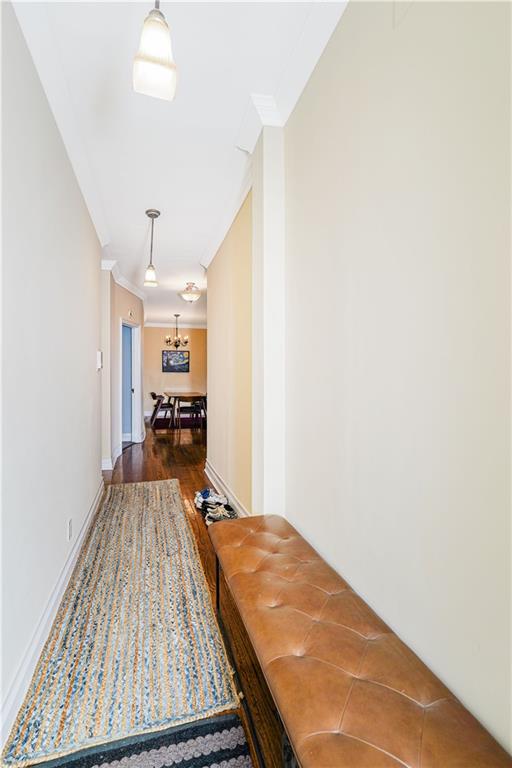 351 Marine Avenue, Unit F11 Brooklyn, NY 11209 - Photo 13 of 23 a view of kitchen and hall with wooden floor