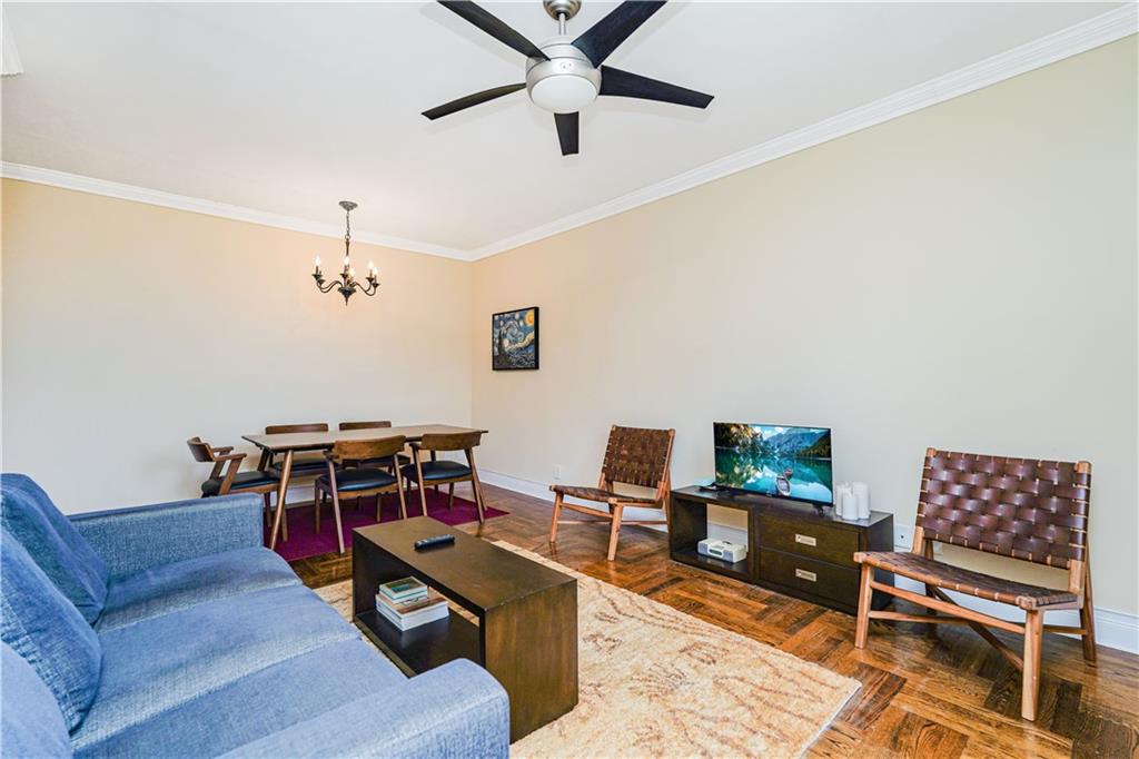 351 Marine Avenue, Unit F11 Brooklyn, NY 11209 - Photo 3 of 23 a work room with furniture and rug