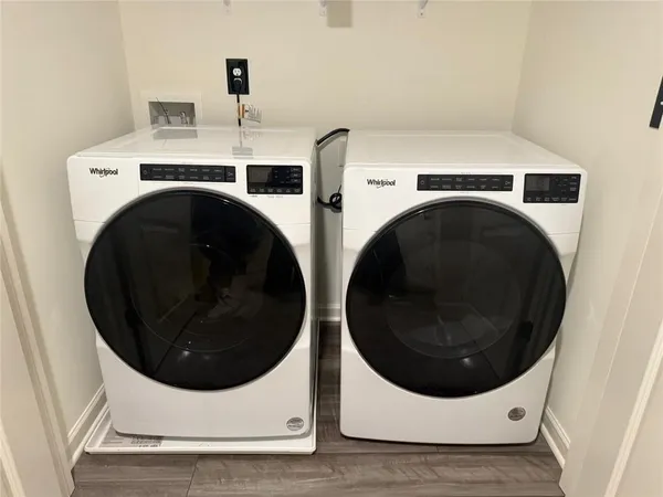 a utility room with dryer and washer