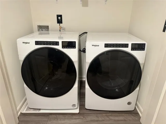 a utility room with dryer and washer