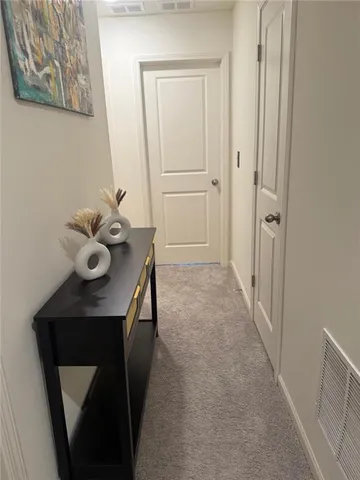 a view of entryway with livingroom