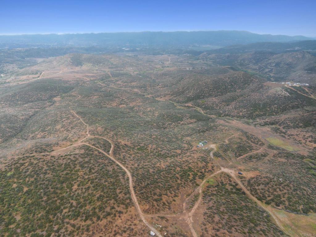 0 Ravenna Lane Hemet, CA 92544 - Photo 18 of 47 a view of a dry yard with wooden floor and mountain view