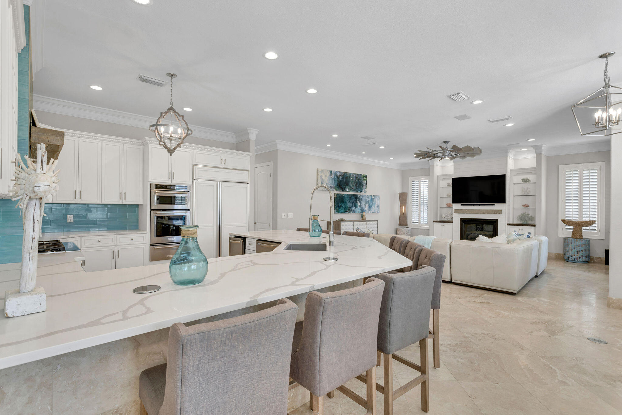 4713 Ocean Boulevard Destin, FL 32541 - Photo 13 of 90 a kitchen with stainless steel appliances kitchen island granite countertop a sink and a refrigerator