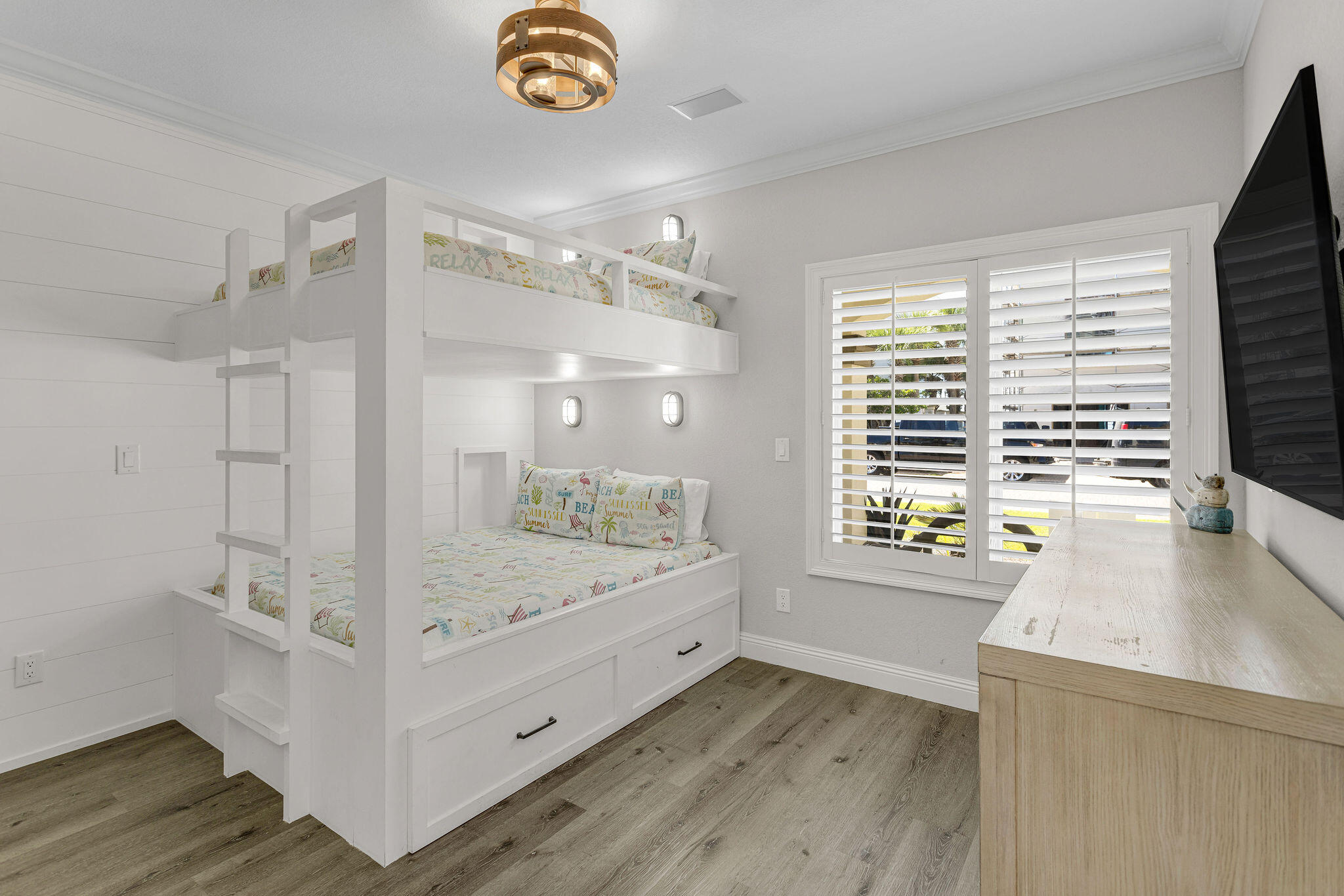 4713 Ocean Boulevard Destin, FL 32541 - Photo 29 of 90 a bathroom with a granite countertop sink a large mirror and a bathtub