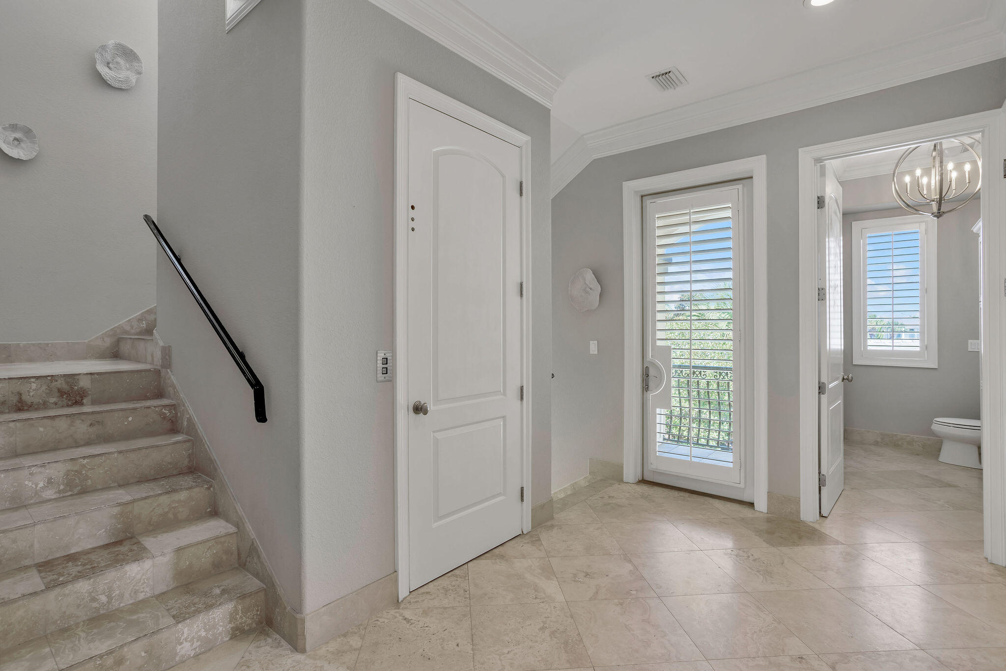 4713 Ocean Boulevard Destin, FL 32541 - Photo 36 of 90 a view of entryway with wooden floor and stairs