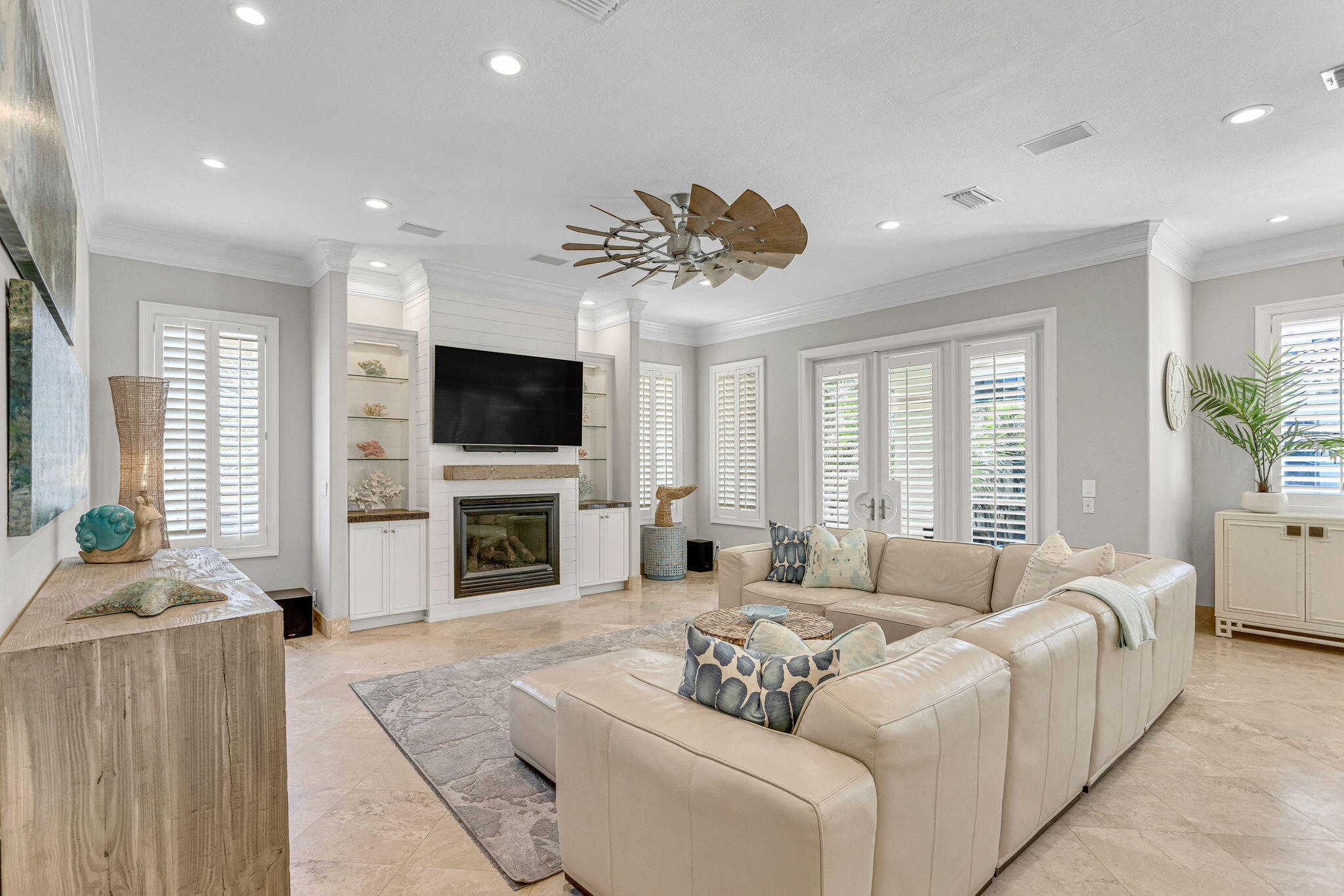 4713 Ocean Boulevard Destin, FL 32541 - Photo 40 of 90 a living room with fireplace furniture and a flat screen tv