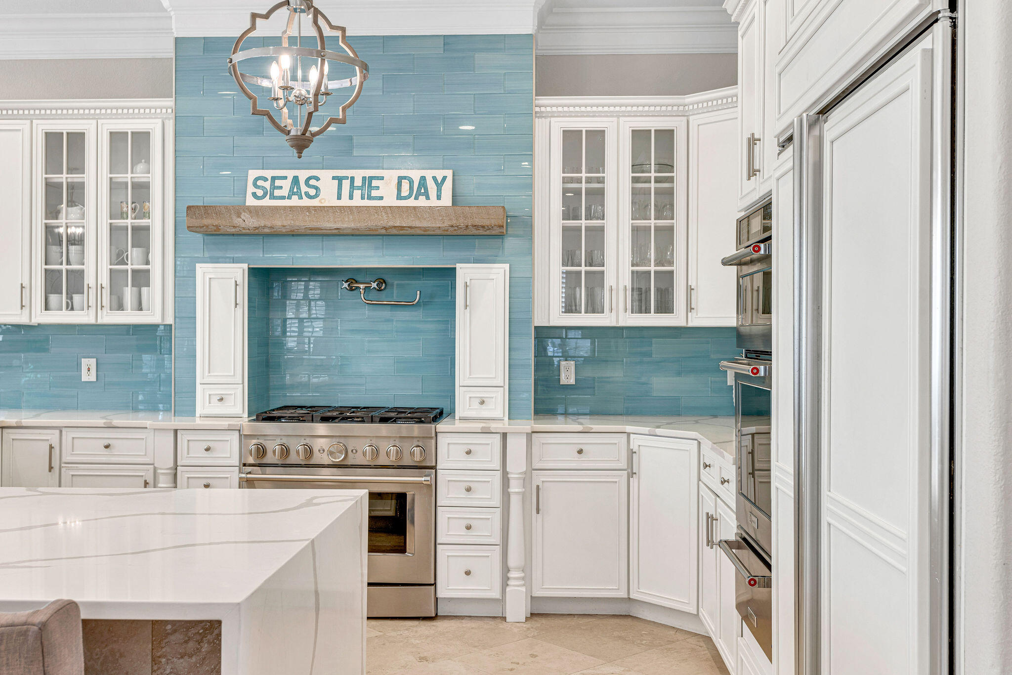 4713 Ocean Boulevard Destin, FL 32541 - Photo 44 of 90 a kitchen with cabinets and window