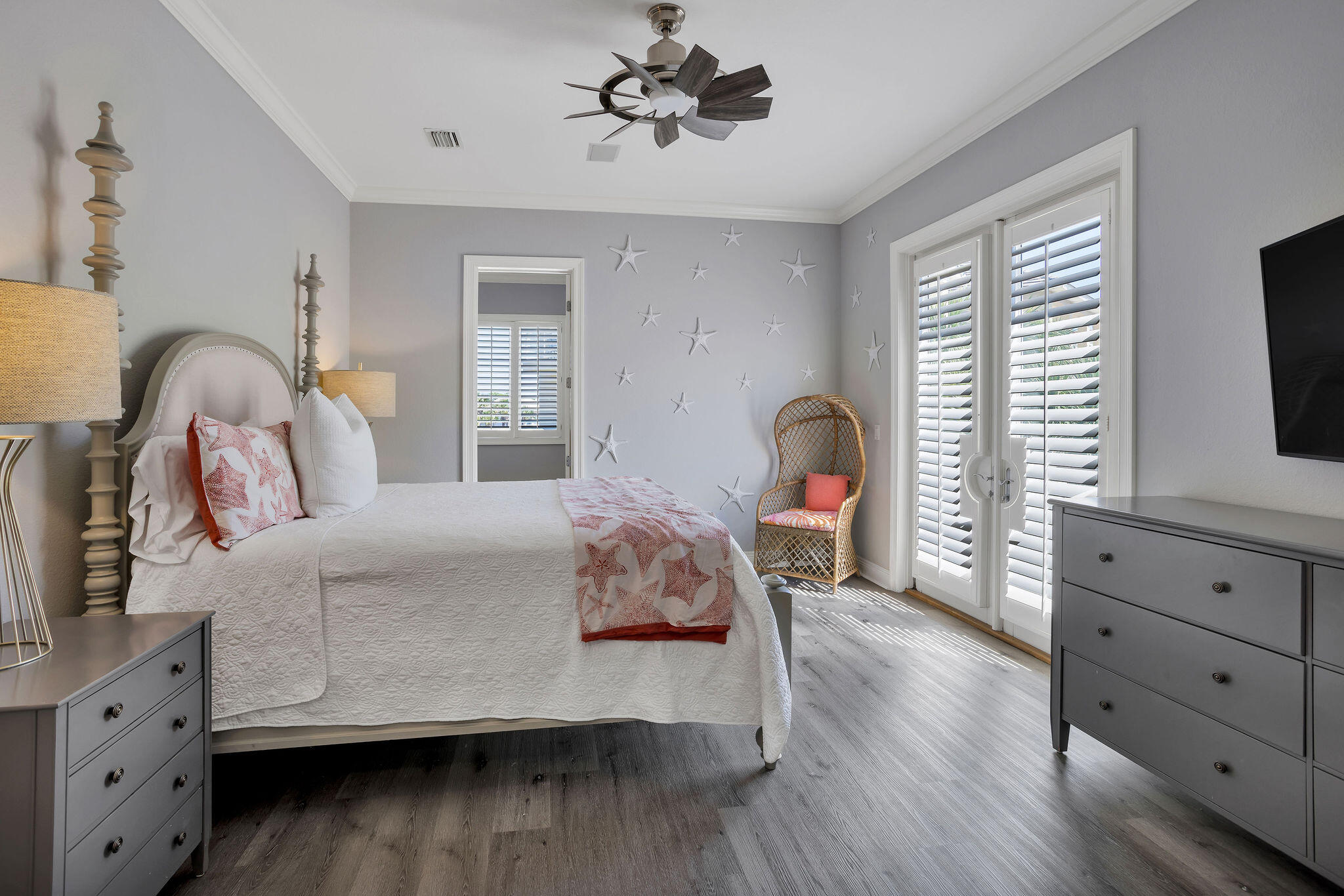 4713 Ocean Boulevard Destin, FL 32541 - Photo 53 of 90 a bedroom with a bed and a flat screen tv
