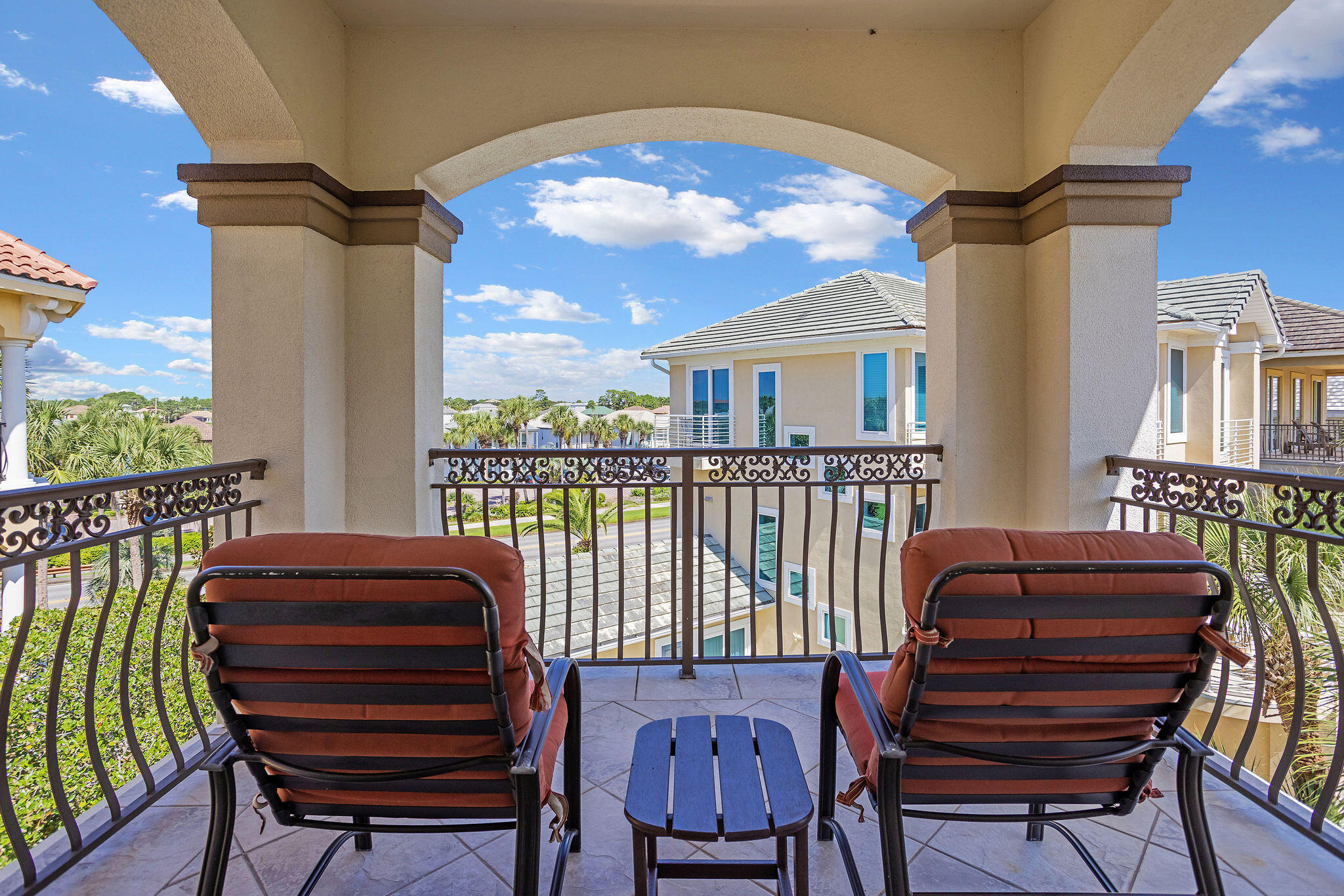 4713 Ocean Boulevard Destin, FL 32541 - Photo 62 of 90 a view of a balcony with furniture