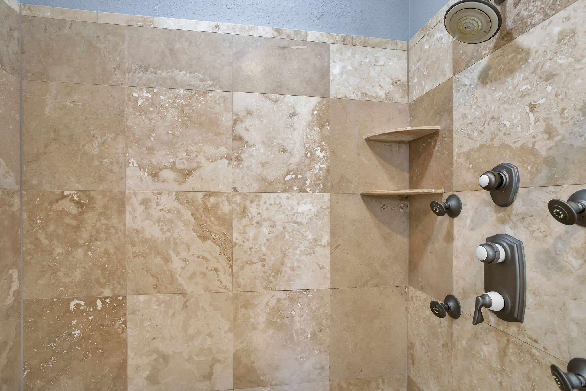 4713 Ocean Boulevard Destin, FL 32541 - Photo 64 of 90 a bathroom with a shower