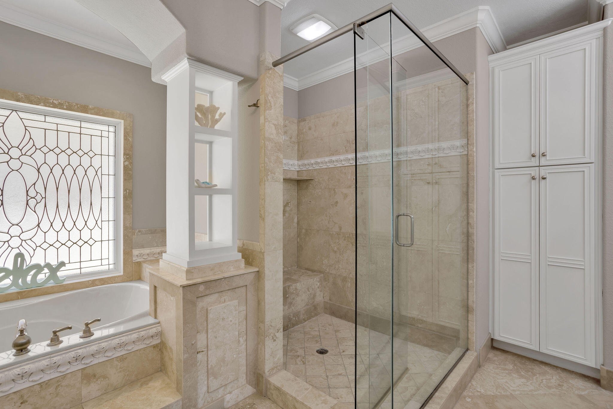 4713 Ocean Boulevard Destin, FL 32541 - Photo 76 of 90 a bathroom with a shower and a tub