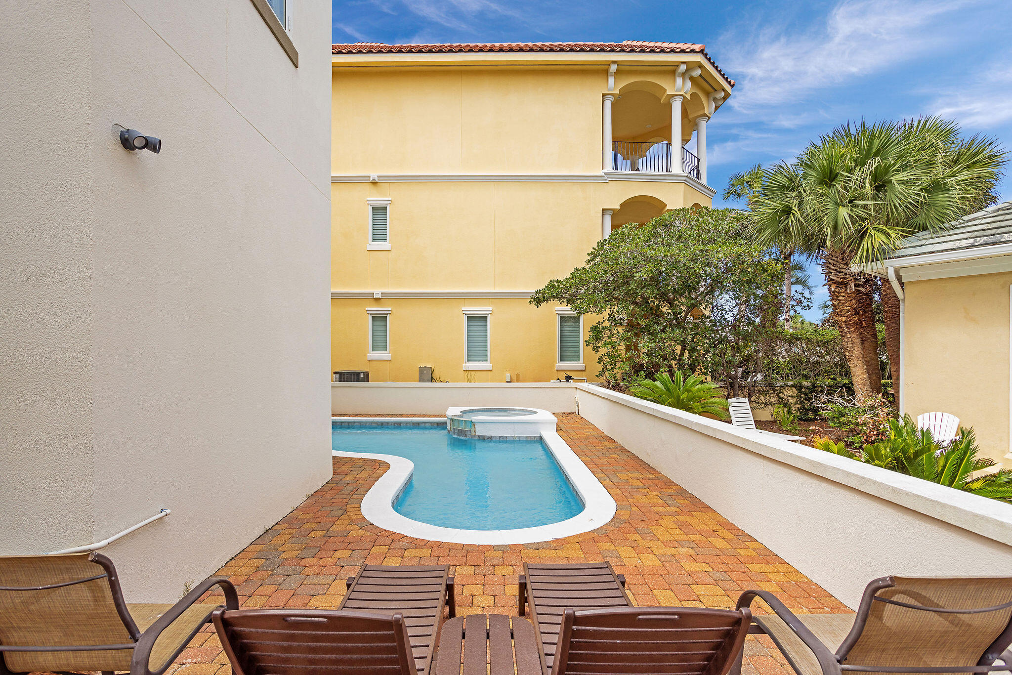 4713 Ocean Boulevard Destin, FL 32541 - Photo 85 of 90 a view of a swimming pool with a chairs
