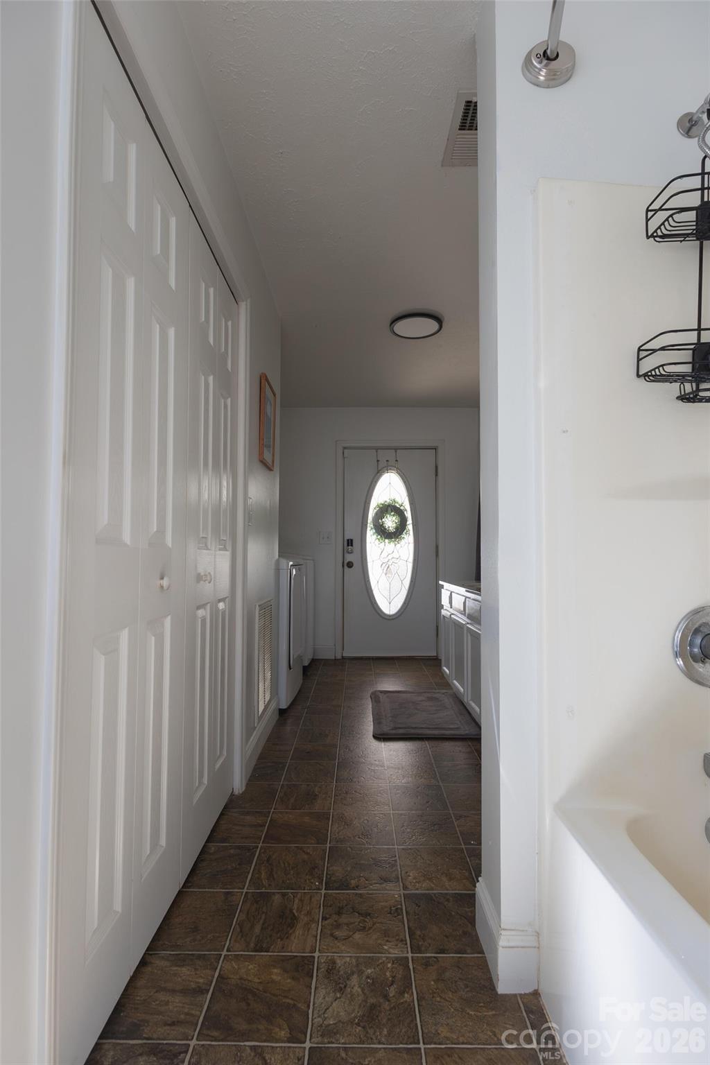 3780 Cook Road Valdese, NC 28690 - Photo 12 of 47 a view of a hallway with wooden floor