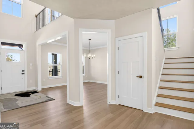 a living room with furniture fireplace and flat screen tv