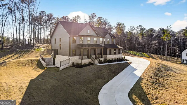 a view of a house with swimming pool