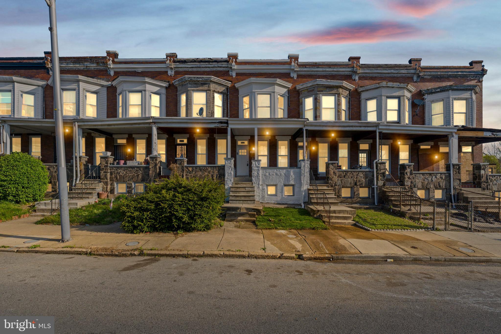 2806 Riggs Avenue Baltimore, MD 21216 - Photo 11 of 32 a view of a building with a porch