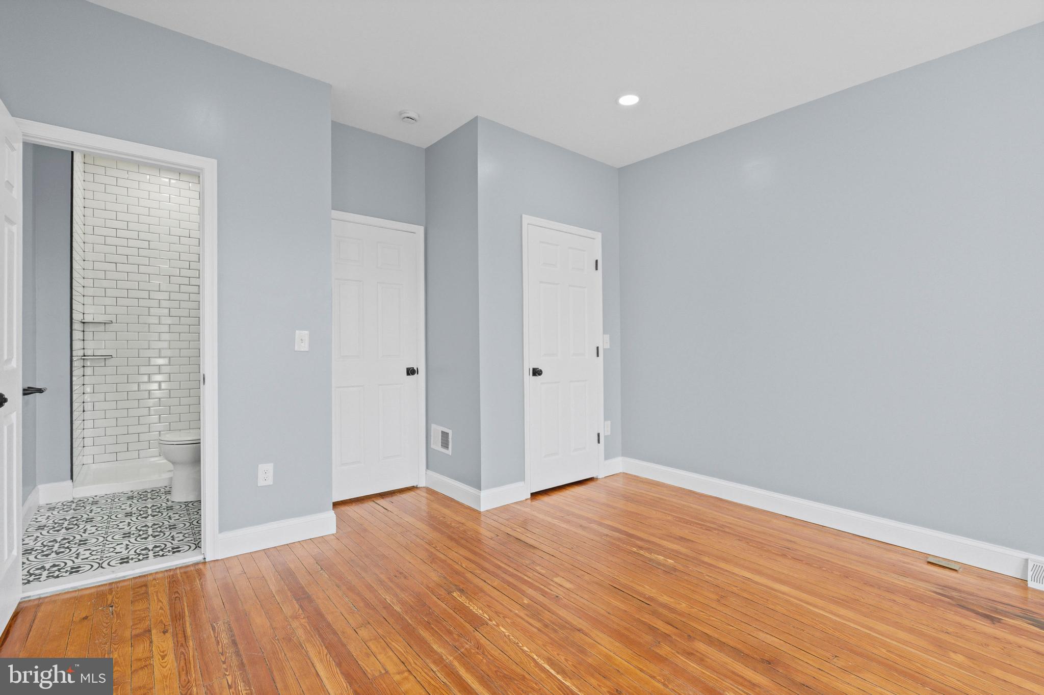 2806 Riggs Avenue Baltimore, MD 21216 - Photo 25 of 32 a big room with wooden floor