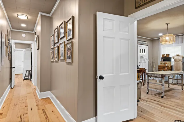 a spacious bedroom with a bed and furniture