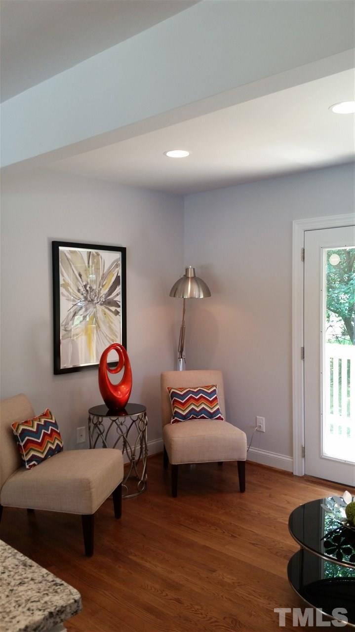 2318 Kennington Road Raleigh, NC 27610 - Photo 8 of 20 a living room with furniture and a rug