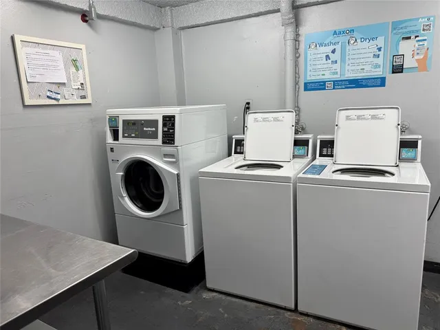 a view of a park with large trees