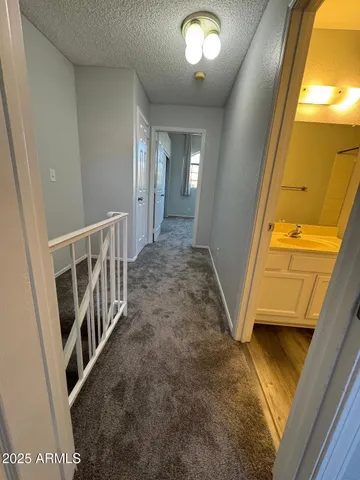 a view of a hallway to of the house