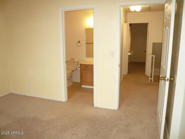 a view of a bathroom from a en suite bathroom