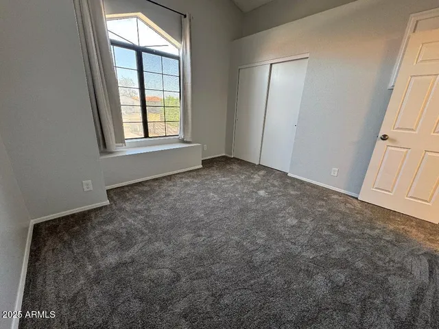 an empty room with windows