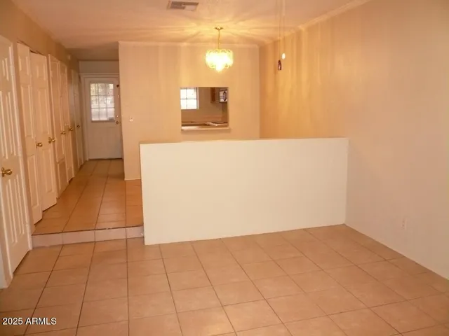 a view of a bathroom with sink and mirror