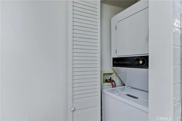 a view of a room that has a window in it