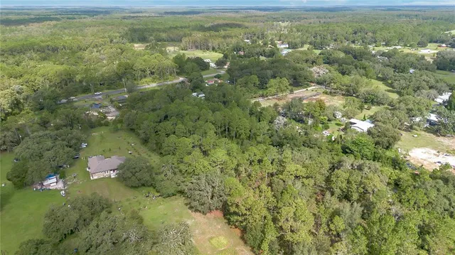 a view of a yard with an outdoor space