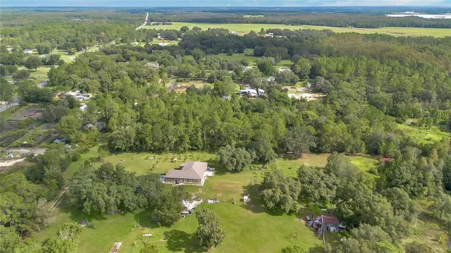 a view of a yard with an outdoor space